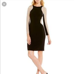 Cocktail dress, beaded sleeves “Xscape”